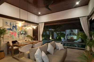 a living room with a couch and a table at 2BR Villa Michelle - Minggu Villas - Special Stay Bonus in Kerobokan