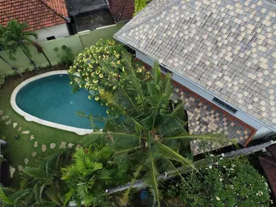 an overhead view of a swimming pool in a yard at Villa Noretsy in Seminyak