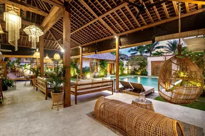 a large room with a pool and a resort at Villa Nabi by Alfred in Bali in Seminyak