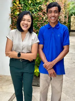 a man and a woman standing next to each other at Villa Alu Lima in Seminyak