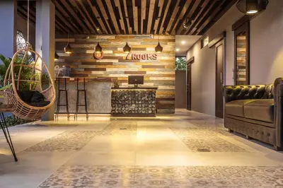 a lobby of a hotel with a reception desk at 7Rooms Villa Seminyak in Seminyak