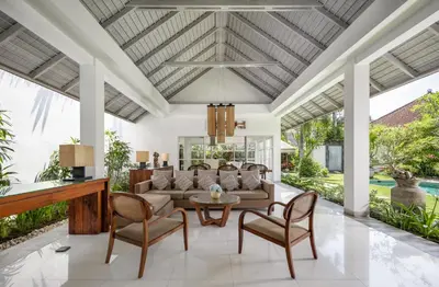 a living room with a couch and chairs and a table at 2BR Private Villa Seminyak, Villa Kiran One in Seminyak