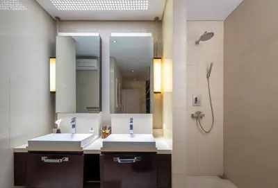 a bathroom with two sinks and a shower at 2BR Private Villa Seminyak, Villa Kiran One in Seminyak