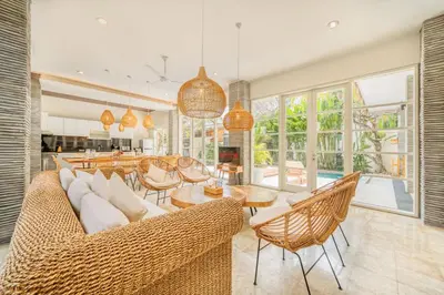 a living room with a couch and chairs and a table at Villa Milano - Private 6 BDR Villa in Seminyak, prime Location, Pool & Garden in Canggu