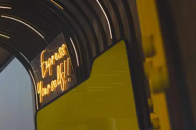 a sign on the side of a window of a building at YELLO Hotel Kuta Beachwalk Bali in Kuta
