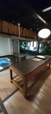 a wooden coffee table sitting on a wooden floor at PROMO Private Vacation Rental Villa 2 Pools 4 Bedrooms 4 Bathrooms Free Scooter up to 3 scooters in Seminyak