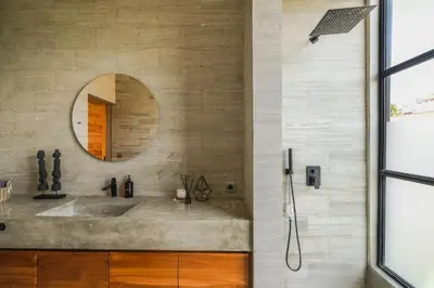 a bathroom with a sink and a mirror at Villa Kamal Umalas in Kerobokan