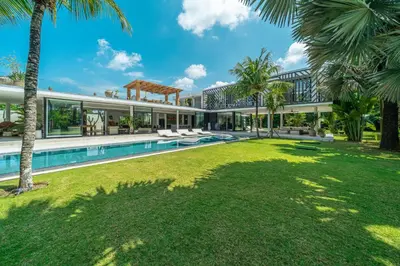 an exterior view of a villa with a swimming pool at Villa Bull House Amazing 6 bedrooms contemporary villa in Seminyak in Seminyak