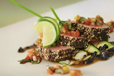 a pile of food with a slice of lime on top at Mars City Hotel in Denpasar