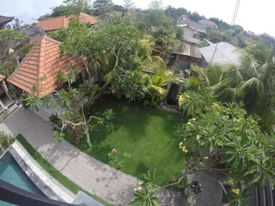 an aerial view of a yard with a pool at Puri Clinton Bali in Nusa Dua