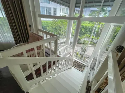 a view from the second floor balcony of a house at Beach House Canggu - 150m Berawa beach in Canggu