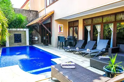 a swimming pool in the backyard of a house at Villa SANKET - KUTA - 6 bedrooms - 6 bathrooms - Great Location in Kuta