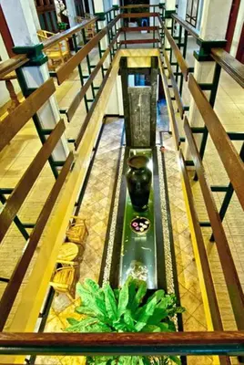 a church altar with a vase in the middle at Kuta EcoStay in Kuta