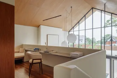 a home office with a desk and a chair at ASAI Village in Jimbaran