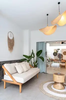 a living room with a couch and a table at Casa de Lupe 5 bedroom villa in Kerobokan in Seminyak