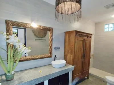 a bathroom with a sink and a mirror at Villa MONTI - LEGIAN - SEMINYAK - Lovely 2 Bedroom Villa - Great Location ! in Seminyak