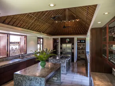 a large bathroom with a counter and a sink at Istana Semer - Balinese Style Private Event Villa, with Large Pool, Gardens and Cook - Near to Canggu & Seminyak in Kerobokan