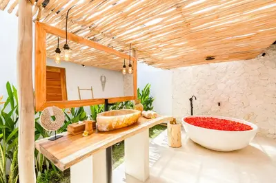 a bathroom with a sink and a counter with a bowl at Villa Chandika - 4 BDR Villa with private Pool, walk to the beach in Seminyak