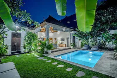 a villa with a swimming pool in a yard at Villa Deba 3 by Bali Villa Solutions in Seminyak
