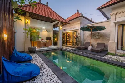 a swimming pool in the backyard of a house at Villa Banua Seminyak in Seminyak