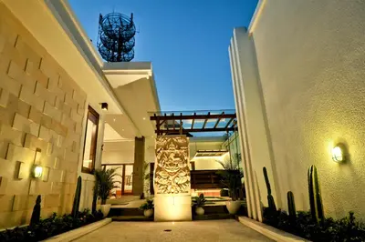 a hallway of a house with a building at Villa Casey in Seminyak