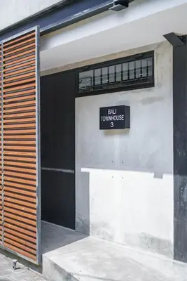 a building with a sign that reads ball township glucose at Villa Bali Townhouse 3 - Modern 2BR Villa with pool - PERFECT LOCATION in Canggu