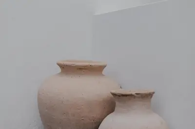 two brown and white vases sitting next to each other at Cozy 2BR Private Pool Villa, Oberoi, Central Seminyak, Bali in Seminyak