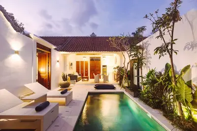 a backyard with a swimming pool and a house at Casa Sintra - Romantic, tranquil hideaway, walk to beach in Seminyak
