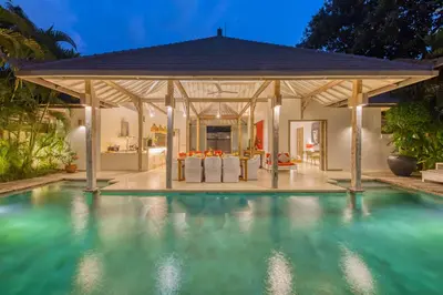 a house with a swimming pool with a gazebo at PROMO 4 bd Spacious villa in strategic location in Seminyak