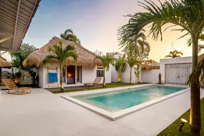 an image of a villa with a swimming pool at Villa Surga Blue by Alfred in Bali in Seminyak