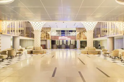 a rendering of the lobby of a hotel at Sunday Hotel Arshika Sunset Road in Kuta