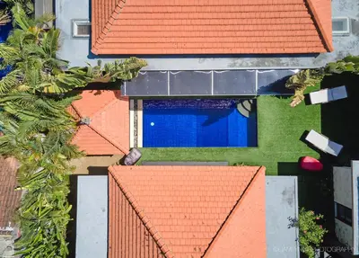 an overhead view of a house with an orange roof at Villa Nicola in Seminyak