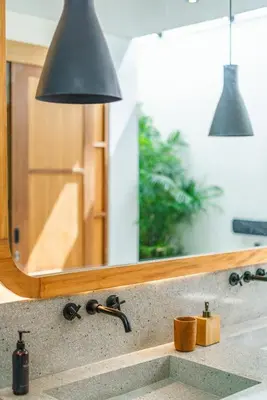 a bathroom counter with a sink and a mirror at Villa Mango 3 - Amazing 4-bdr Villa in Berawa ! PERFECT LOCATION ! in Canggu
