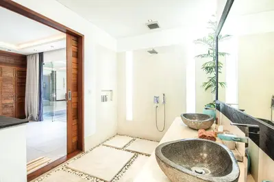 a bathroom with two sinks on a counter at Villa Nikko I - 4Br Villa in Central Seminyak, Steps to Cafés & Shops in Seminyak