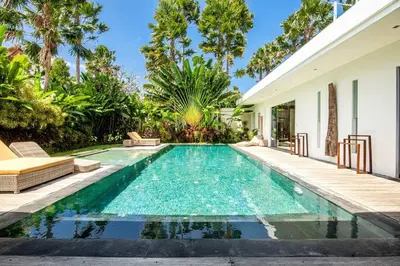 a swimming pool in the backyard of a house at Villa Nikko I - 4Br Villa in Central Seminyak, Steps to Cafés & Shops in Seminyak