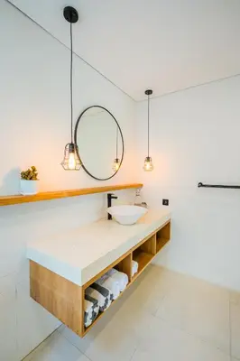 a bathroom with a sink and a mirror at 4 Bdr -Villa Donna, Fast Wi-Fi & Private Pool in Canggu