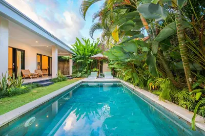 a swimming pool in the backyard of a villa at 4 Bdr -Villa Donna, Fast Wi-Fi & Private Pool in Canggu
