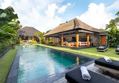 an image of a villa with a swimming pool at Villa Wolfe by Villa Finder in Seminyak