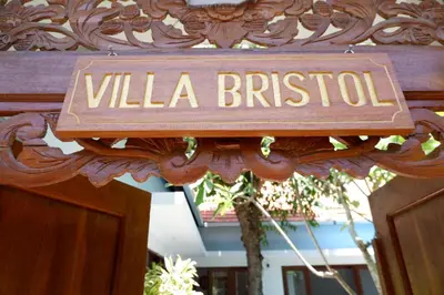 a sign that says villa bristol on a wooden door at Villa Bristol in Seminyak