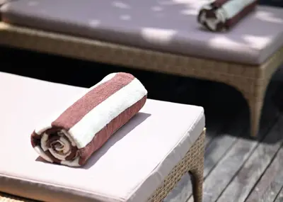 a piece of sushi sitting on top of a table at Villa Searenity Seminyak in Seminyak