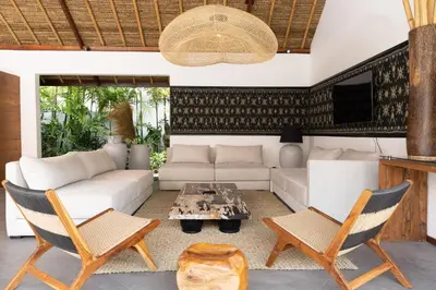 a living room with a couch and chairs and a table at Large 6-Bedroom Private Villa with Pool for Groups & Families - Umalas in Kerobokan