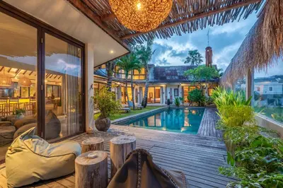an image of a house with a swimming pool at Villa Tarita Canggu in Kerobokan