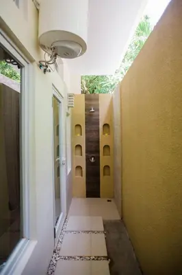 a hallway of a house with at Donguri House Bali in Jimbaran