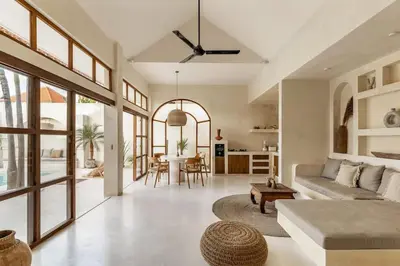 a living room with a couch and a table at NEW Design villa, Casa Alma Bali, 2BR with private pool in Canggu