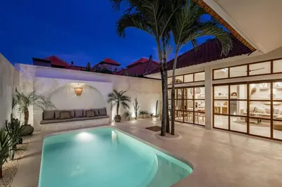 a swimming pool in the backyard of a house at NEW Design villa, Casa Alma Bali, 2BR with private pool in Canggu