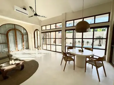 a large living room with a table and chairs at NEW Design villa, Casa Alma Bali, 2BR with private pool in Canggu