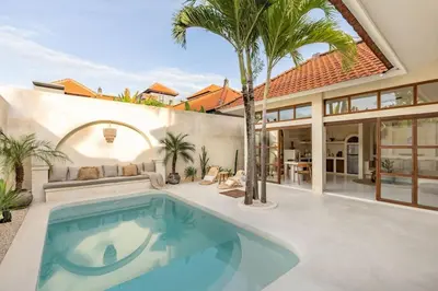 a swimming pool in the backyard of a house at NEW Design villa, Casa Alma Bali, 2BR with private pool in Canggu