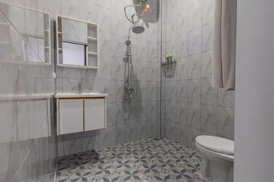 a bathroom with a toilet and a sink at Bali DD homestay seminyak in Seminyak