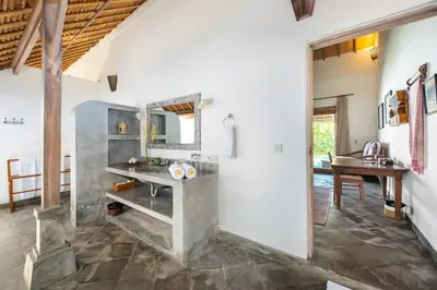 a bathroom with a sink and a mirror at Gorgeous Balinese Designed 3 Bed Villa, Top Pick! in Seminyak