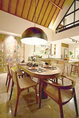 a dining room with a table and chairs at MASARA Villa - 5Min to Canggu - 2Min to Shops & Restaurants in Canggu